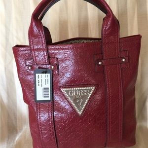 Guess burgundy  textured close body satchel